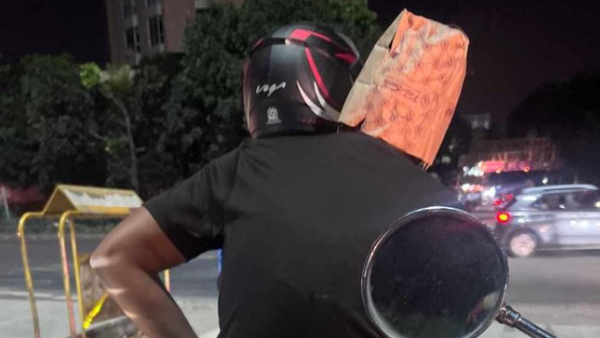 Paper Bag As A Helmet? Bengaluru Pillion Riders Unusual Style Leaves Netizens Chuckling