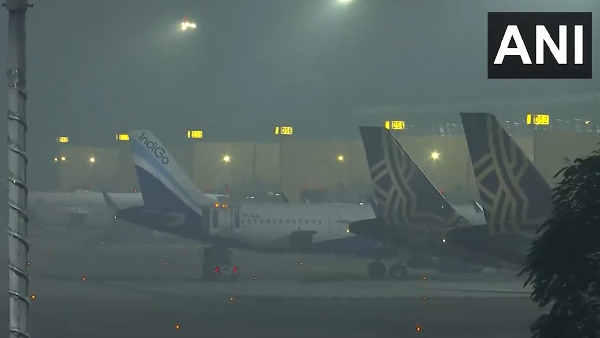 Few flights delayed due to fog and low visibility in the national capital; Visuals from Indira Gandhi International Airport