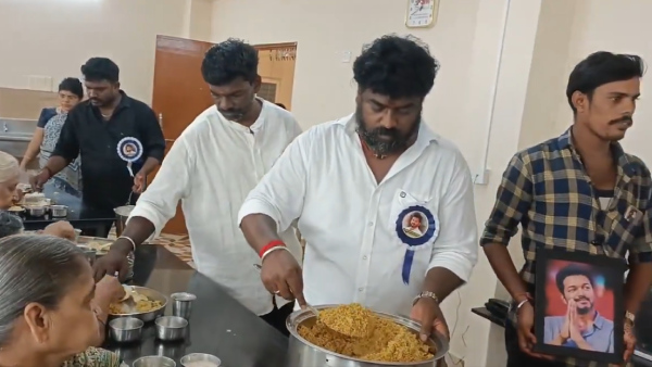 Tamil Actor Vijay Trolled After Fans Serve Food To Chennai Flood-Affected People Holding His Pic