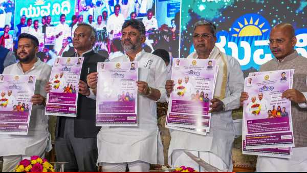 Karnataka Chief Minister Siddaramaiah and Deputy Chief Minister DK Shivakumar during the launch of the Karnataka governments scheme for unemployed youths titled Yuvanidhi, at Vidhana Soudha in Bengaluru