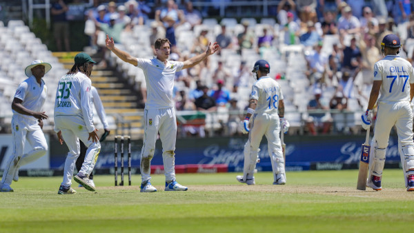 South Africas Nandre Burger celebrates with teammates after taking the wicket of India’s Shubman Gill on the first day of the second Test cricket match between India and South Africa, at the Newlands Cricket Ground, in Cape Town