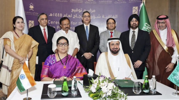 Union Minister of Minority Affairs Smriti Irani and Minister of State for External Affairs V. Muraleedharan with Saudi Minister of Haj and Umrah Affairs Tawfiq Al Rabiah during signing of the Bilateral Haj Agreement 2024 between India and Saudi Arabia, in Jeddah.