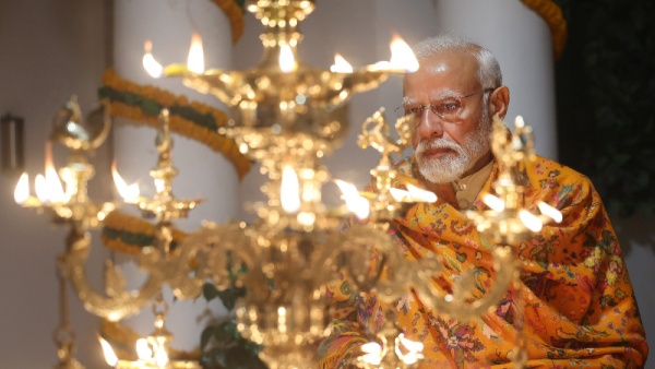 PM Narendra Modi Lights Up Diyas At His Residence