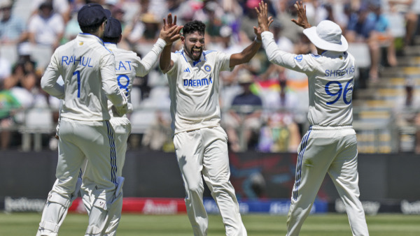 India’s Mohammed Siraj celebrates a wicket with teammates on the first day of the second Test cricket match between India and South Africa, at the Newlands Cricket Ground, in Cape Town, South Africa