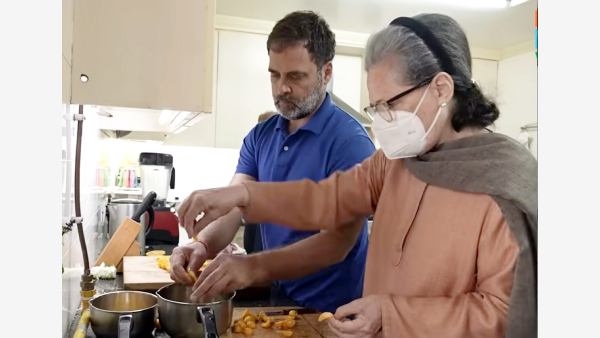 Congress leaders Sonia Gandhi and Rahul Gandhi work in the kitchen to prepare orange marmalade.