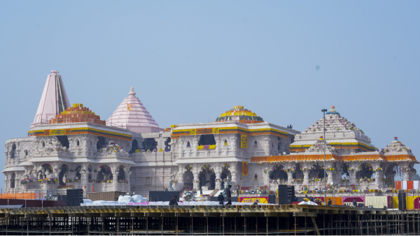 Ram Temple being decorated with flowers on the eve of its consecration ceremony, in Ayodhya