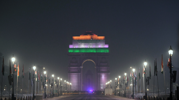  India Gate illuminates in tricolour on the eve of the 75th Republic Day, in New Delhi