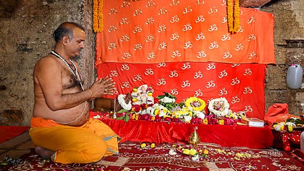 A priest performs prayers in the basement of Gyanvapi mosque
