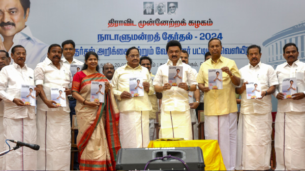Tamil Nadu Chief Minister and Dravida Munnetra Kazhagam DMK chief MK Stalin with party leaders TR Baalu Kanimozhi A Raja and others releases the party s candidates list and manifesto during a party meeting in Chennai