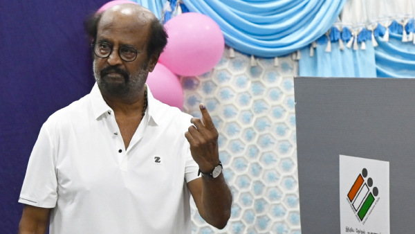 Veteran actor Rajinikanth shows his finger marked with indelible ink after casting his vote for the first phase of Lok Sabha elections at a polling station in Chennai