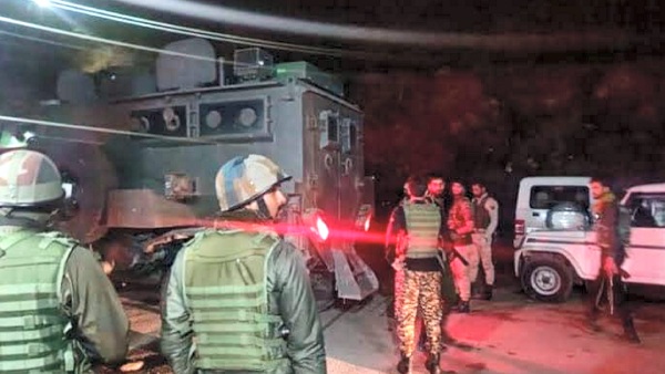 Security personnel during a cordon and search operation Security personnel during a cordon and search operation