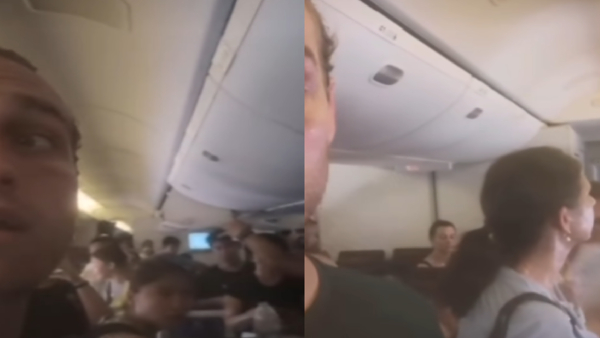 VIRAL VIDEO Of Qatar Airways Chaos Passengers Strip Off And Faint Amid Air Conditioning Breakdown