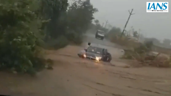 4 Narrowly Escape As Car Washes Away