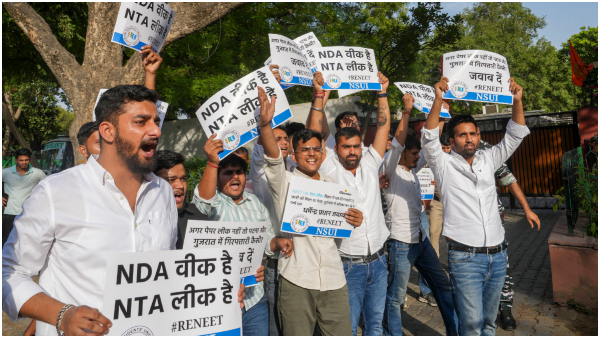 NSUI members stage a protest demanding re-examination of NEET-UG Entrance Exam 2024 over alleged irregularities in its results at Jantar Mantar in New Delhi Thursday June 13 2024