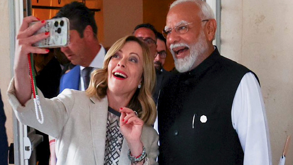 Prime Minister of Italy Giorgia Meloni takes a selfie with Prime Minister Narendra Modi on the sidelines of the G7 summit in Apulia Italy