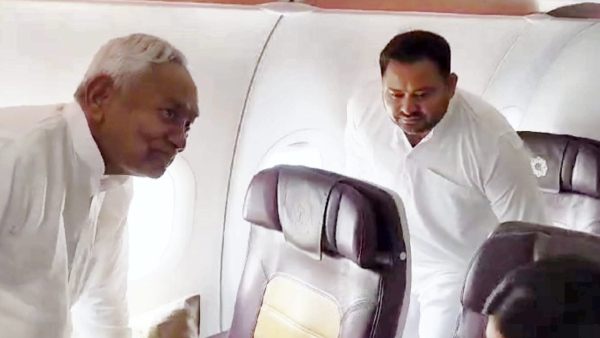 Viral Video Shows Nitish Kumar Tejashwi Yadav Together In Flight To Delhi This Is How Social Media Reacts
