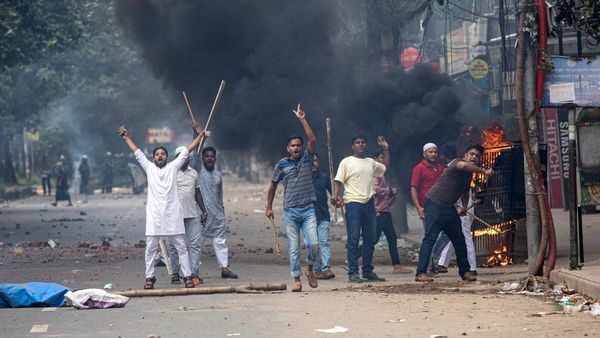 Students clash with police during a protest over the quota system in public service in Dhaka Bangladesh Friday July 19 2024
