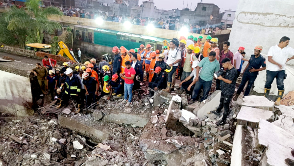 Officials and others during a rescue operation after a building collapse in Surat Saturday July 6 2024 A six-storey residential building collapsed in Pal area of the city on Saturday afternoon