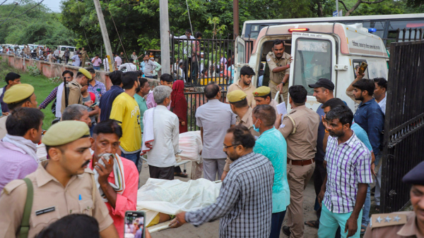 Victims s bodies of the Hathras stampede being carried at Sikandra Rao in Hathras Tuesday July 2 2024