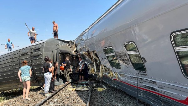 WATCH - Russia Train-Truck Accident Injures 140 Derails Multiple Carriages