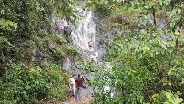 Karnataka Police Take Away Clothes Of Tourists Ignoring Waterfall Ban In Chikkamagaluru