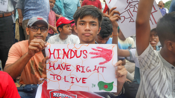 Bangladesh Hindu community members participate in a protest and block the Shahbagh intersection in Dhaka Bangladesh 10 August 2024