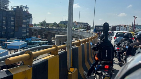 Bengaluru s Double-Decker Flyover Bottleneck Midday Traffic Snarls Affect Commuters