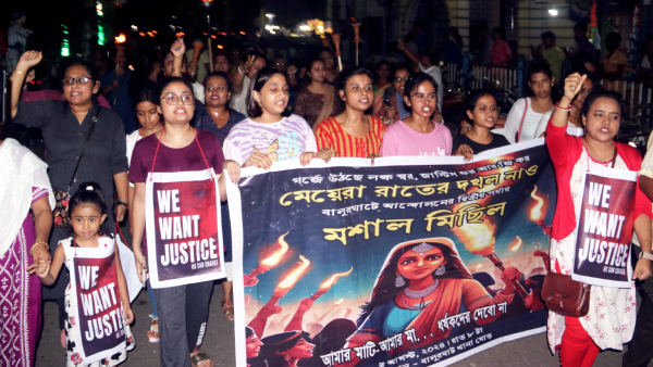 Women march during a protest against the alleged rape and murder of a woman doctor at Kolkata s RG Kar Medical College and Hospital at Balurghat in South Dinajpur district Sunday Aug 18 2024