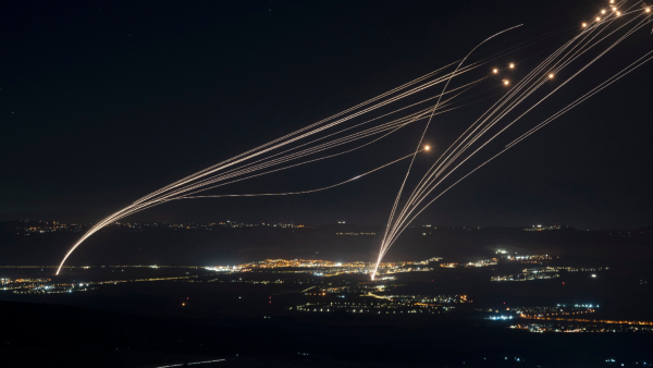 The Israeli Iron Dome air defense system fires to intercept an attack from Lebanon