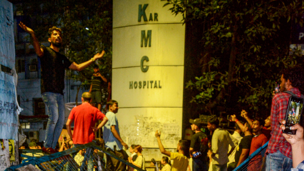 Protestors at the RG Kar Medical College and Hospital during a protest against the alleged rape and murder of a trainee doctor inside the hospital premises in Kolkata early Thursday Aug 15 2024 Unidentified miscreants entered the premises of the state-run hospital shortly after midnight on Thursday and vandalised portions of the medical facility where the body of a woman doctor was found last week police said