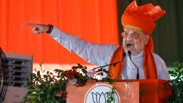 Union Home Minister Amit Shah addresses during a party worker meet ahead of Jammu and Kashmir Assembly elections in Jammu Saturday Sept 7 2024
