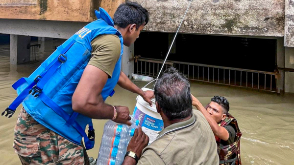 Indian Army personnel provide relief material to residents of a flooded area in Gujarat Indian Army conducted relief operations in the flooded areas of Vadodara Jamnagar and Rajkot Indian Army personnel provide relief material to residents of a flooded area in Gujarat Indian Army conducted relief operations in the flooded areas of Vadodara Jamnagar and Rajkot