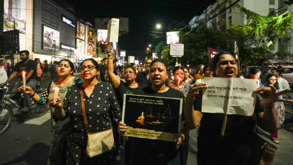 People during a candlelight march in protest against the alleged rape and murder of a trainee woman doctor at the RG Kar Medical College and Hospital in Kolkata Wednesday Sept 4 2024