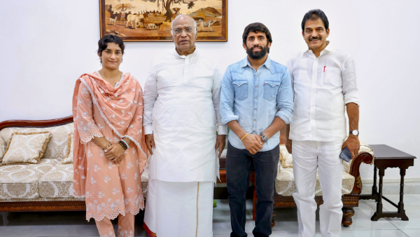 Congress President Mallikarjun Kharge and party MP KC Venugopal meet wrestlers Vinesh Phogat and Bajrang Punia in New Delhi Friday Sept 6 2024 Phogat and Punia have joined the Congress on Friday ahead of the Haryana Assembly polls