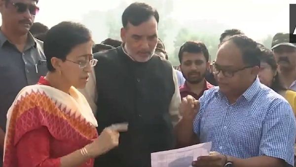 Delhi CM Atishi Environment Minister Gopal Rai With Other Officials