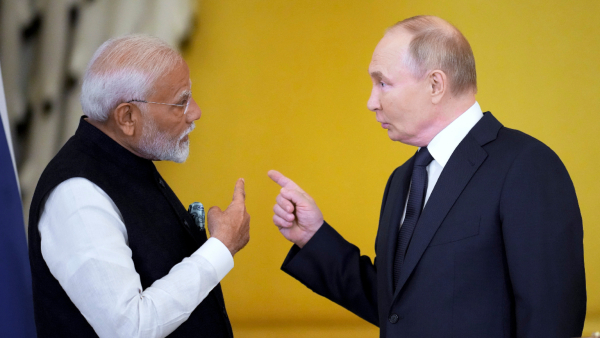 Russian President Vladimir Putin right and Indian Prime Minister Narendra Modi