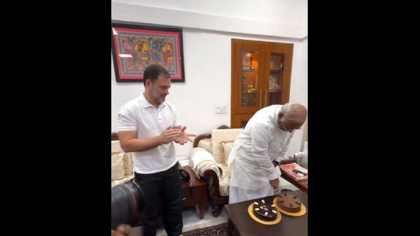 Gandhi Aids Barber with Essential Supplies