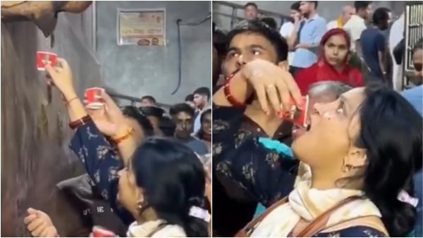 Devotees Drink Dripping AC Water