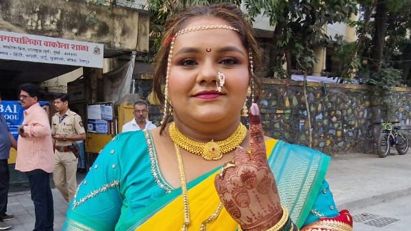Bride Casts Vote In Wedding Attire