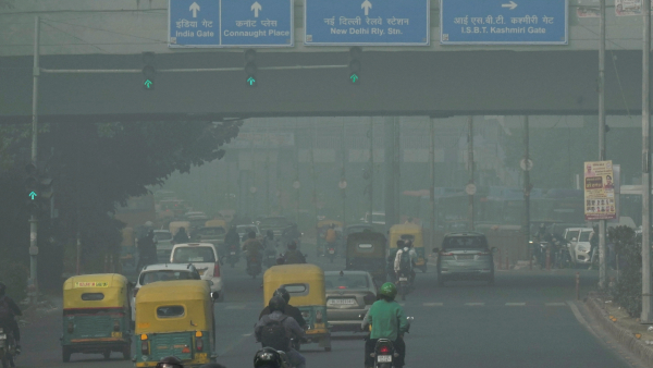 Vehicles move amid smog at Vikas Marg in New Delhi Friday Nov 15 2024 Delhi woke up to GRAP Stage III restrictions on Friday as the city s air quality remained in the severe category for the third consecutive day prompting strict measures to curb pollution levels