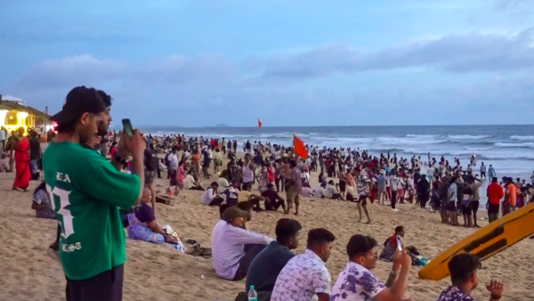 Tourists at a sea beach during tourism season in north Goa s Calangute Thursday Oct 17 2024