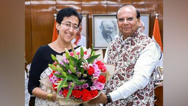 Delhi Lieutenant Governor VK Saxena and CM Atishi