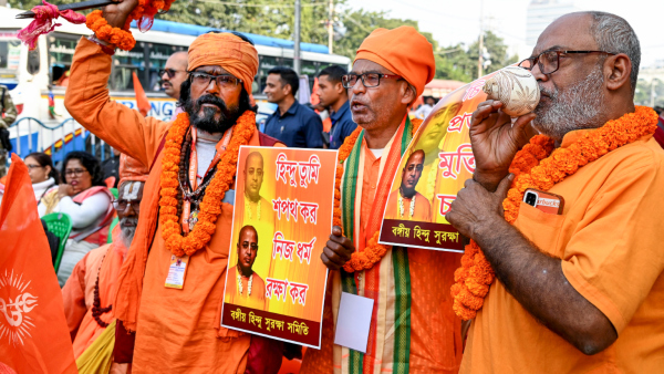Monks take part in a rally on the occasion of Vijay Diwas to protest against the alleged atrocities over Hindu minorities in Bangladesh in Kolkata Monday Dec 16 2024