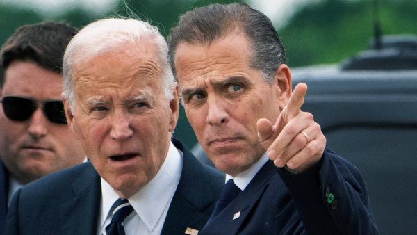 US President Joe Biden talks with his son Hunter Biden