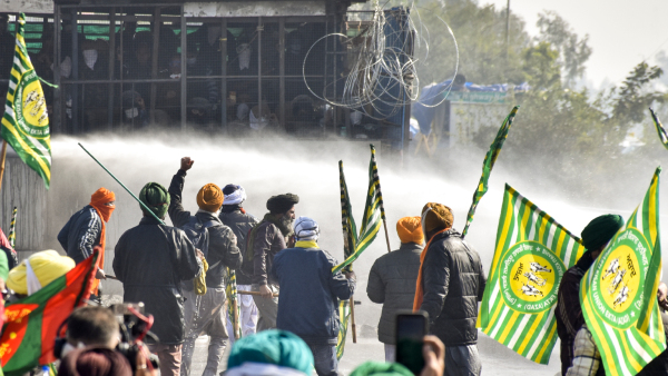 Security personnel use water cannons to disperse farmers agitating at Shambhu border in Patiala district Punjab Saturday Dec 14 2024 Security personnel use water cannons to disperse farmers agitating at Shambhu border in Patiala district Punjab Saturday Dec 14 2024