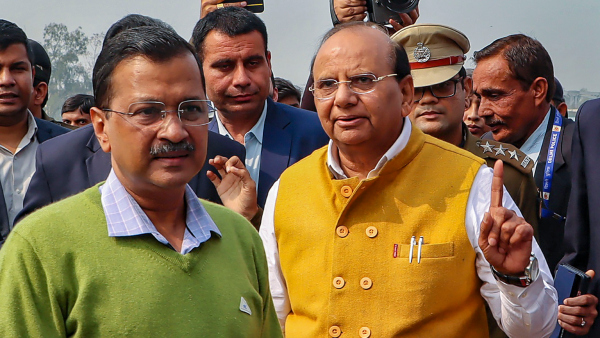 Arvind Kejriwal with Delhi Lt Governor VK Saxena