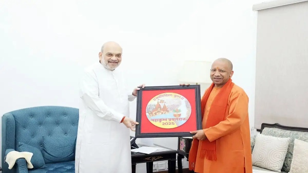 UP CM Yogi Adityanath Invites Union Minister Amit Shah