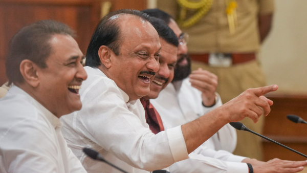 NCP chief Ajit Pawar with party leader Praful Patel and BJP leader Devendra Fadnavis at the Governor house as Mahayuti stakes claim for formation of the new government in Mumbai Wednesday Dec 4 2024
