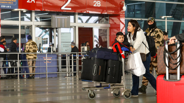 Passengers at Indira Gandhi International Airport during a cold and foggy winter morning in New Delhi Saturday Jan 4 2025
