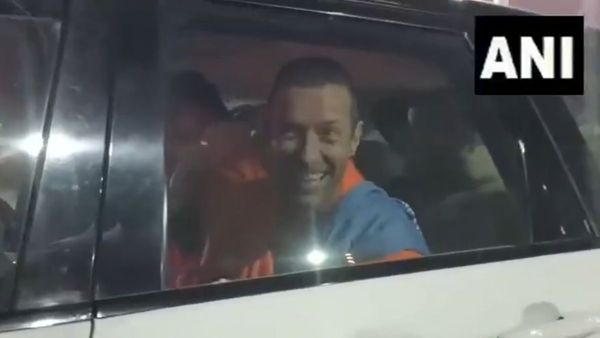 Chris Martin And Dakota Johnson Attend Maha Kumbh Mela During India Tour